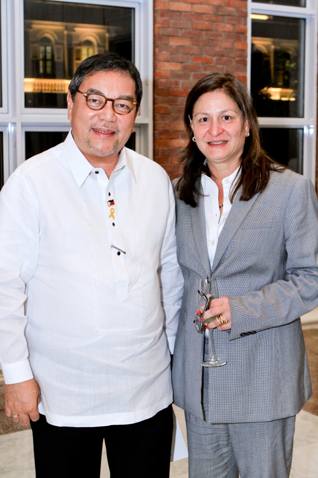 Department of Tourism Secretary Ramon Jimenez, Jr. and Tourism Congress of the Philippines president Rosana Fores
