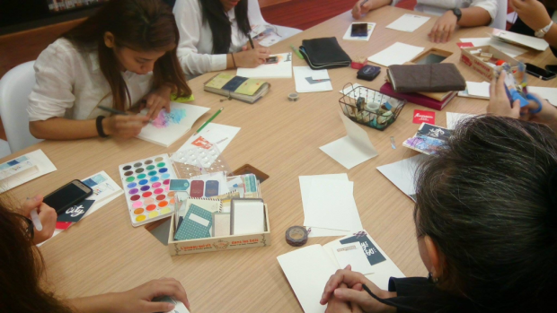 Participants get busy in designing their own journals