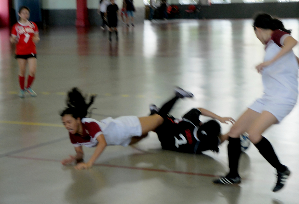 Cristel Seed takes a bad fall, as CEU goal keeper seeks to recover.