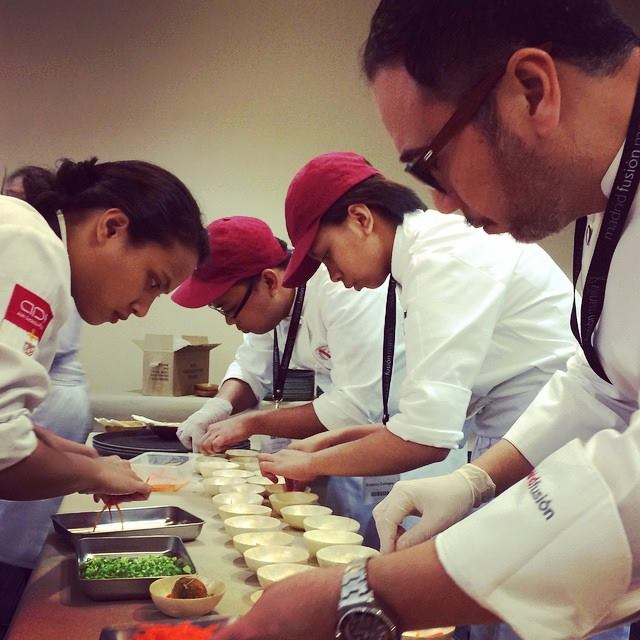 Enderun volunteers working side by side with Chef Fernando Aracama