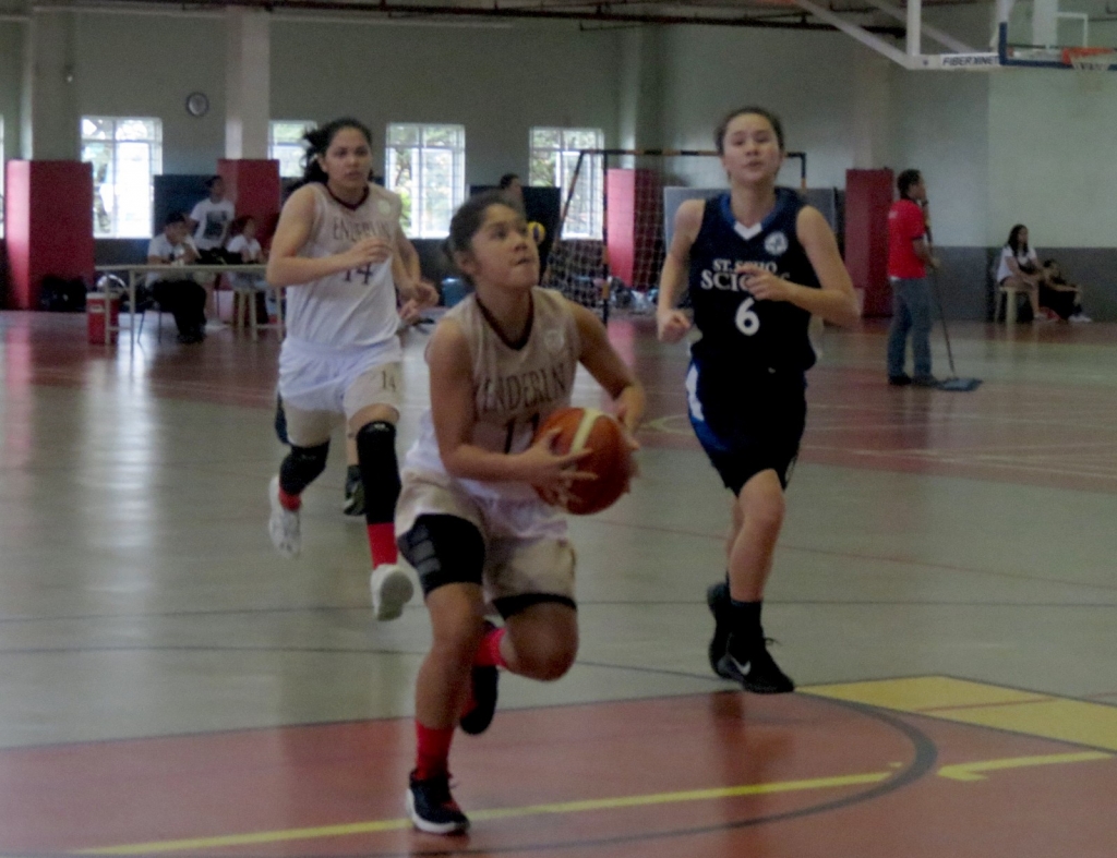 Shaina Marcos goes in for the layup