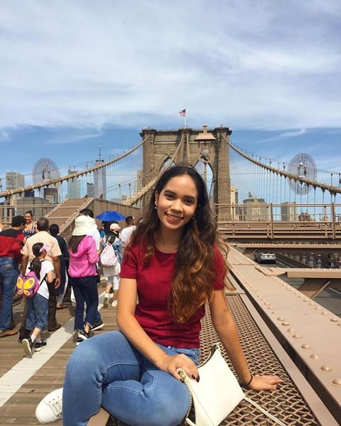 Ameena Athab, relaxing atop Brooklyn Bridge, after ballet practice.