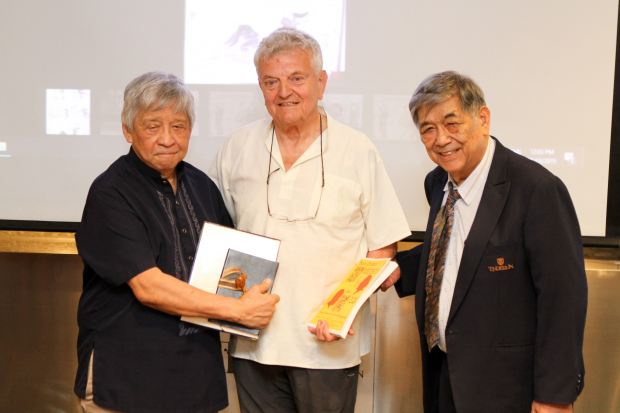 Enderun Colleges President Edgardo Rodriguez (leftmost) and Enderun Colleges Enderun Colleges Department Head of General Education Carlos Arnaldo (rightmost) presents Certificate of Appreciation and a copy of a recent publication entitled Hans Christian Andersen and Jose Rizal: From Denmark to the Philippines to Dr. Fritz Hack (middle).